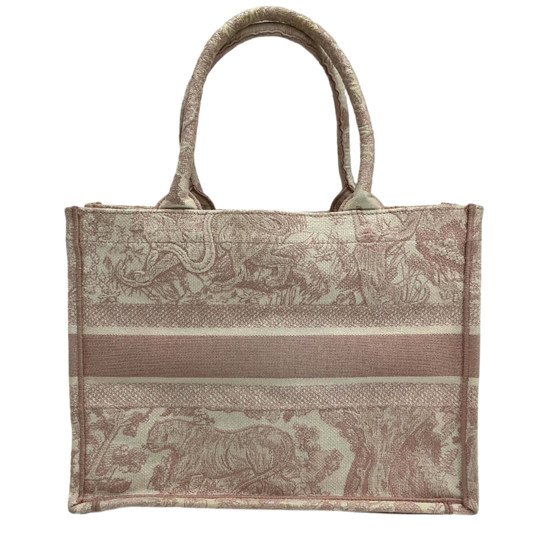 Christian Dior Medium Dioriviera Book Tote in rose embroidered canvas with iconic Toile De Jouy design.