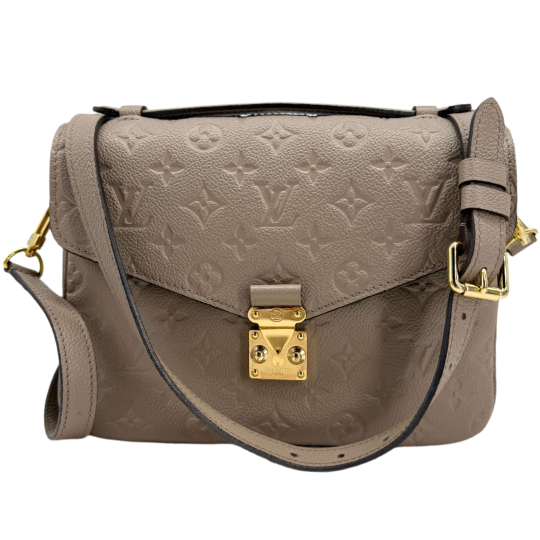 Louis Vuitton Pochette Métis in Tourterelle Grey Monogram Empreinte Leather with gold-tone hardware
