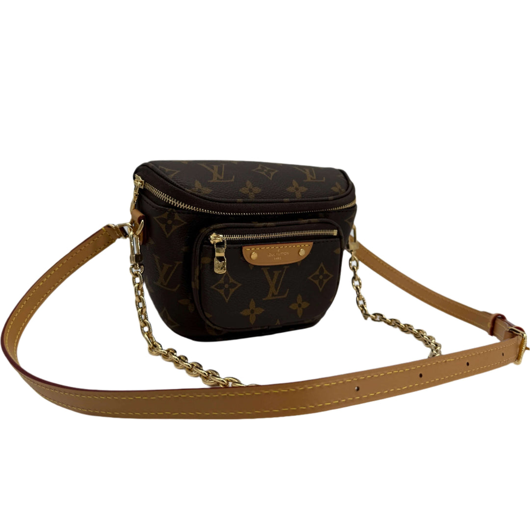 Louis Vuitton Mini Bumbag in Monogram Canvas with adjustable leather strap and removable chain.