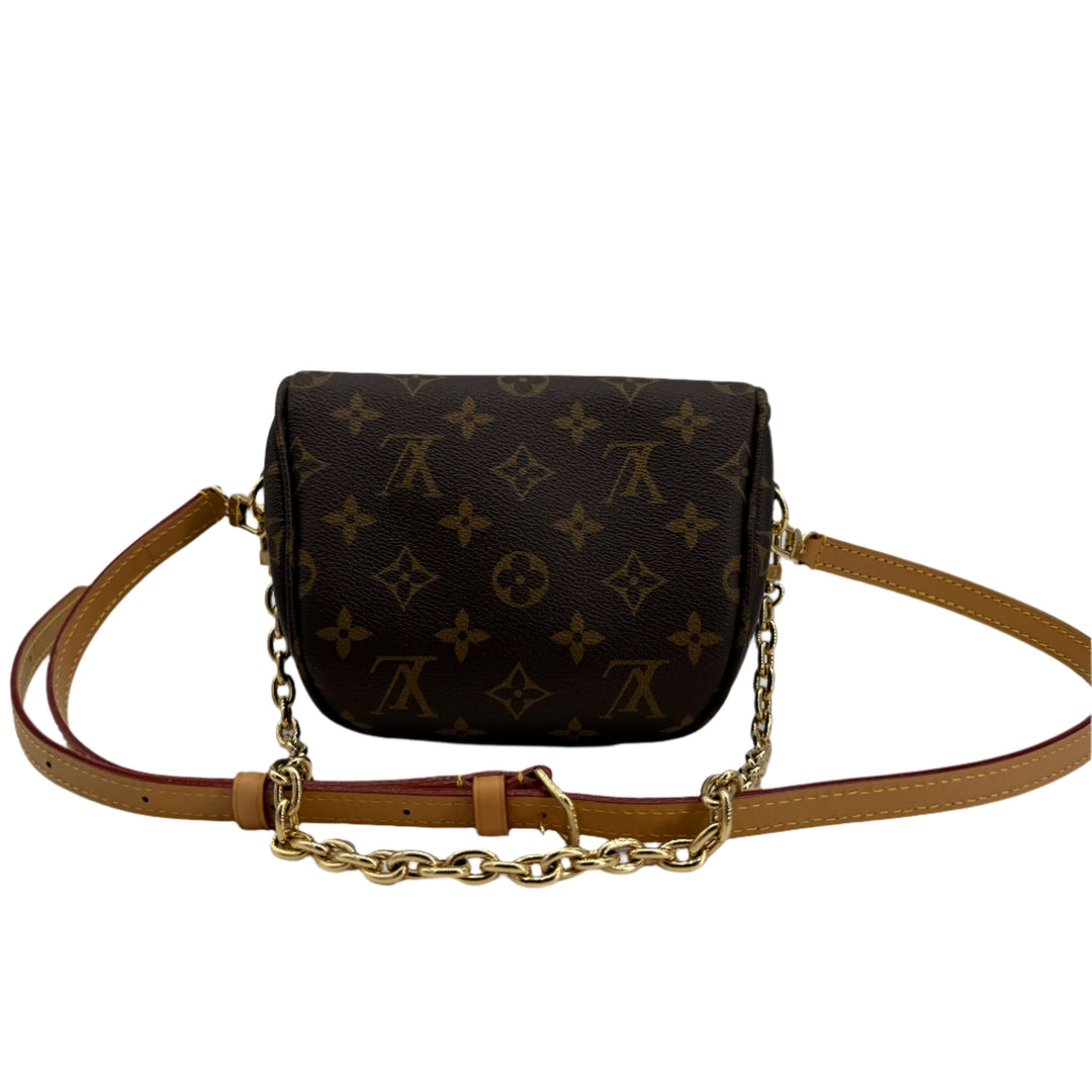 Louis Vuitton Mini Bumbag in Monogram Canvas with adjustable leather strap and removable chain.