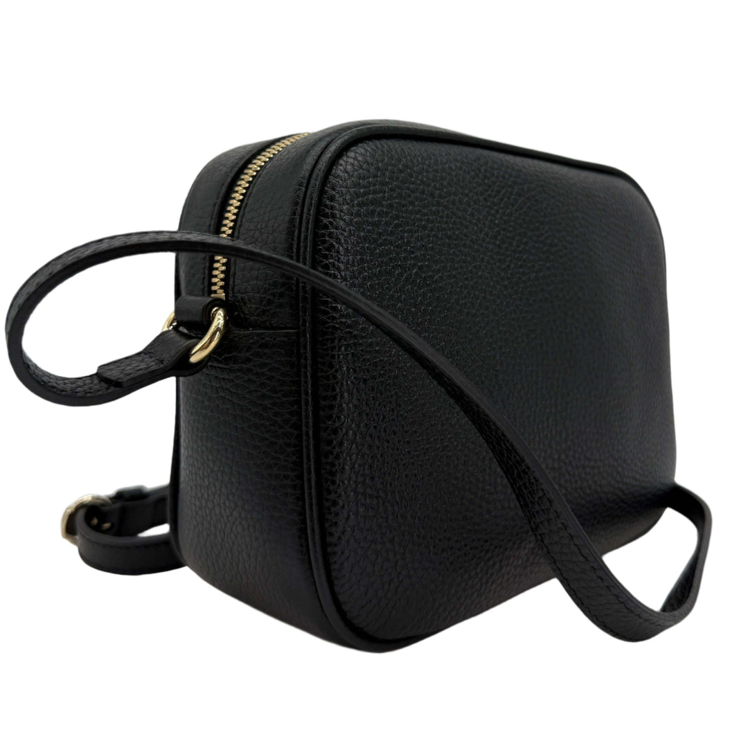 Gucci Small Soho Disco Bag in black pebbled calfskin leather with gold tassel, stylish crossbody design.