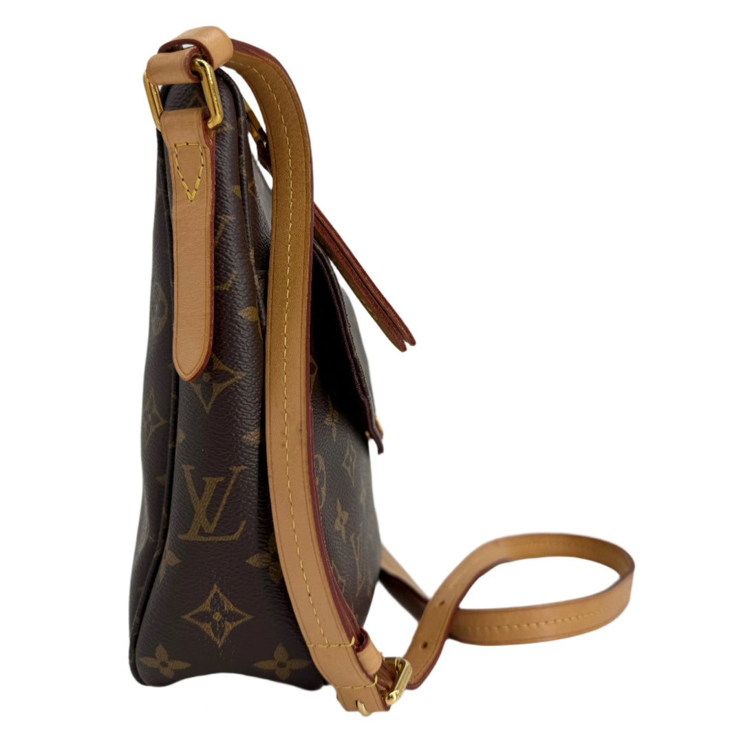 Side view of Louis Vuitton Monogram Mabillon Shoulder Bag showcasing iconic monogram canvas and adjustable strap.