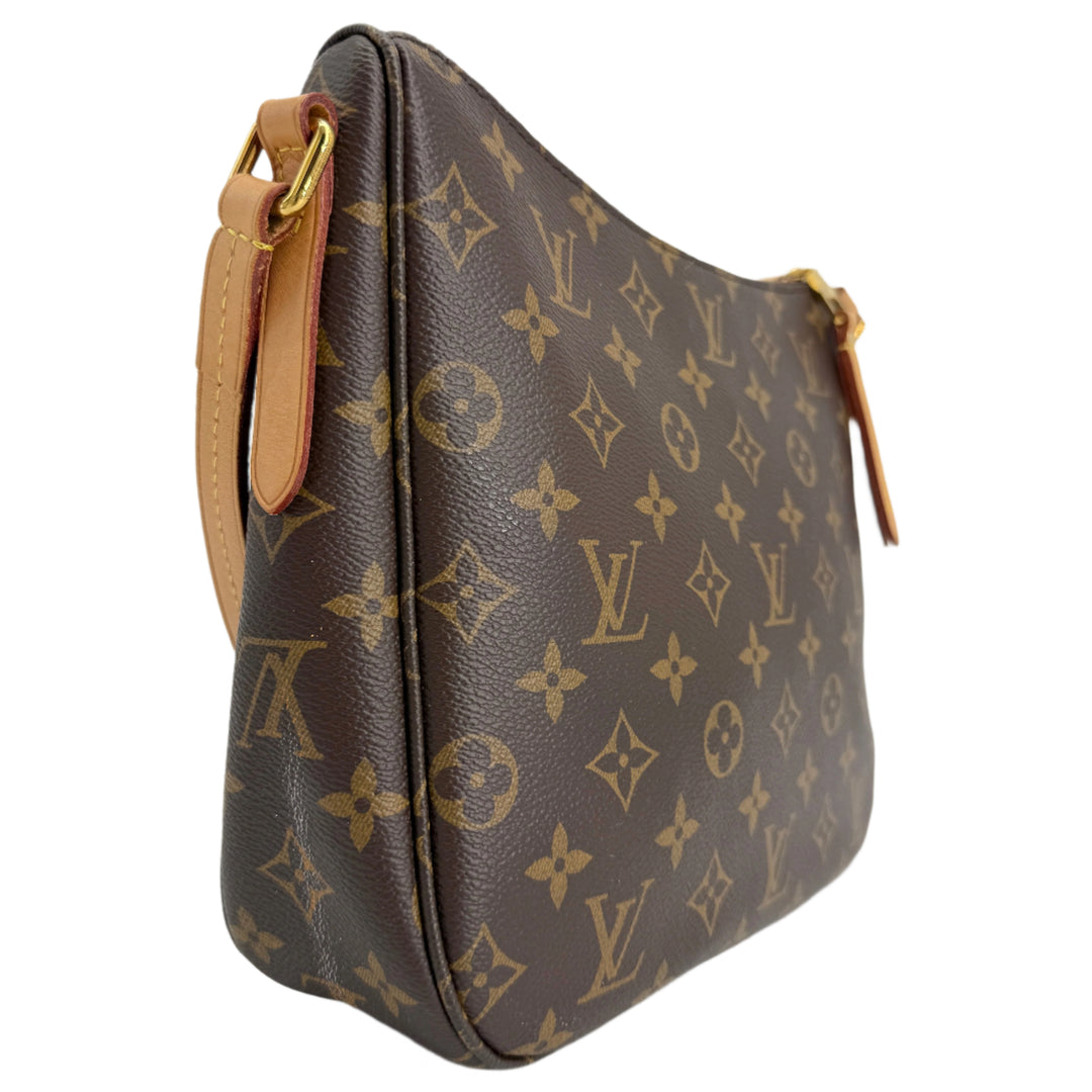 Side view of Louis Vuitton Monogram Mabillon Shoulder Bag crafted in monogram coated canvas with a smooth shoulder strap.