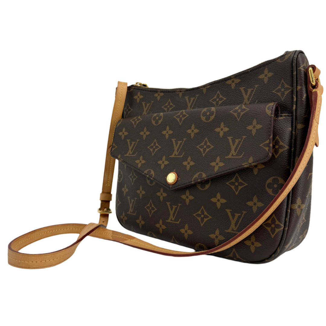 Louis Vuitton Monogram Mabillon Shoulder Bag featuring signature canvas, brass hardware, and adjustable strap.