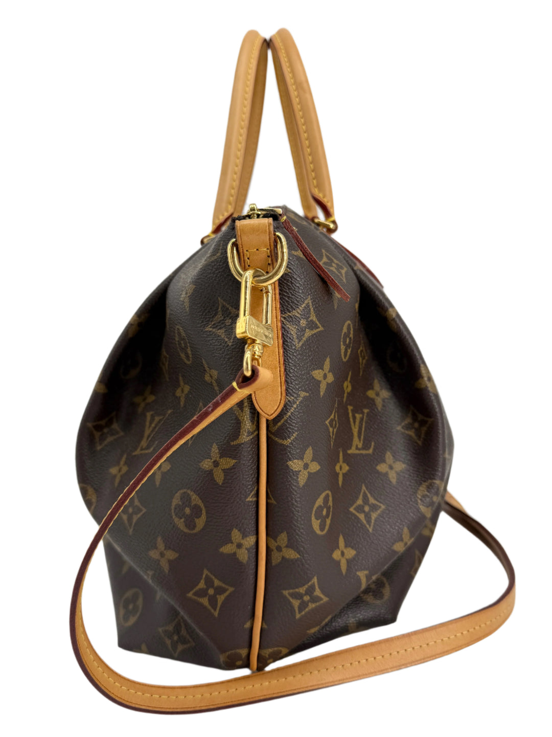 Louis Vuitton Monogram Turenne MM bag with top handle and crossbody strap in coated canvas.
