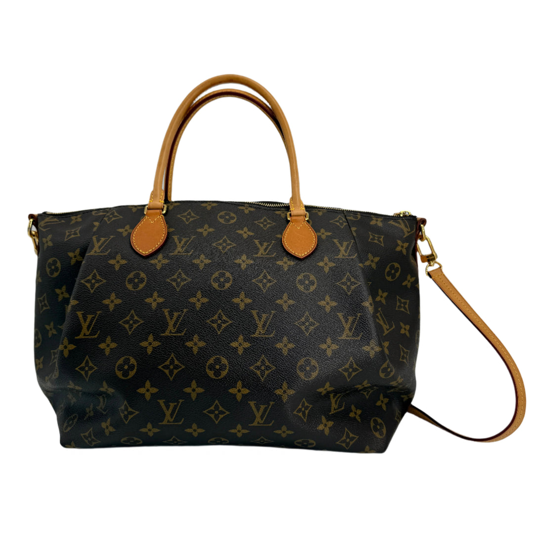 Louis Vuitton Monogram Turenne MM handbag with top handles and crossbody strap, crafted in coated canvas.