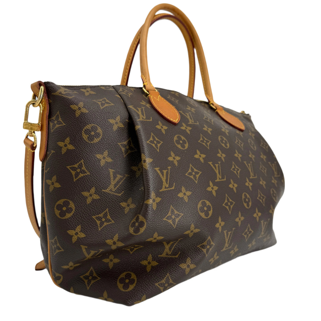Louis Vuitton Monogram Turenne MM bag featuring top handles and a stylish design in coated canvas.