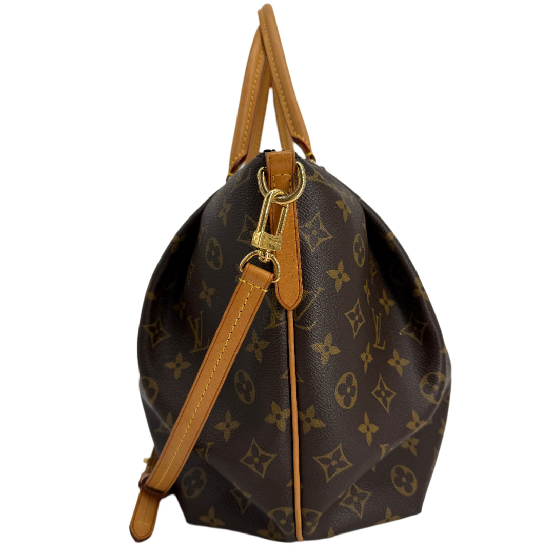 Louis Vuitton Monogram Turenne MM bag showcasing brown monogram canvas, natural vachetta handles, and adjustable crossbody strap.