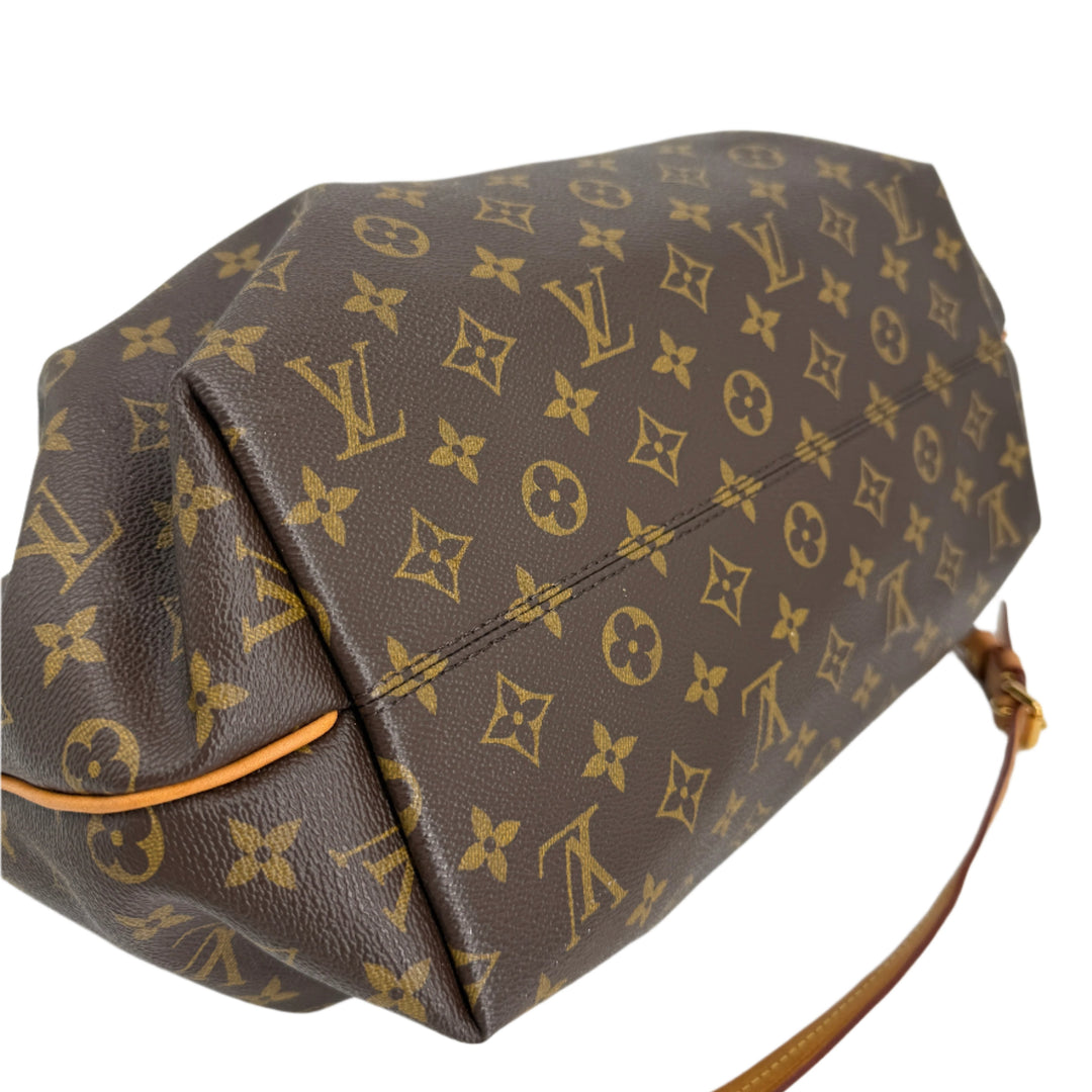 Louis Vuitton Monogram Turenne MM handbag showcasing top handle and crossbody design in elegant coated canvas.