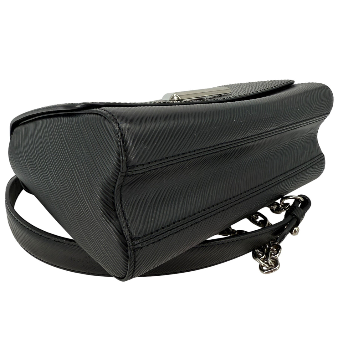 Louis Vuitton Epi Twist MM Black Crossbody Shoulder Bag side view showcasing iconic design and silver LV twist lock.