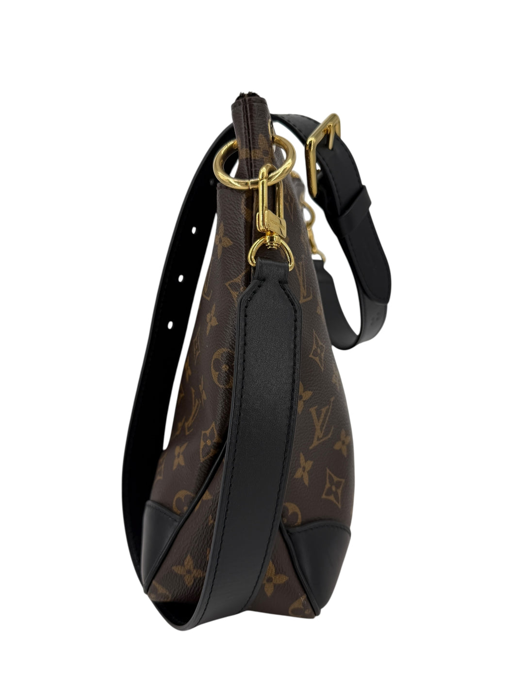Side view of Louis Vuitton Monogram Odeon MM shoulder bag with black trim and adjustable strap.