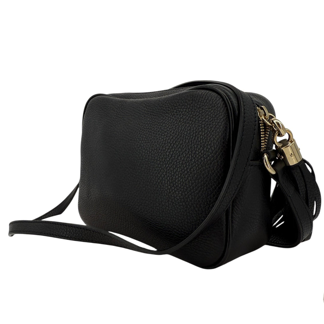 Gucci Soho Disco Small Crossbody in black pebbled calfskin with tassel detail and adjustable strap.