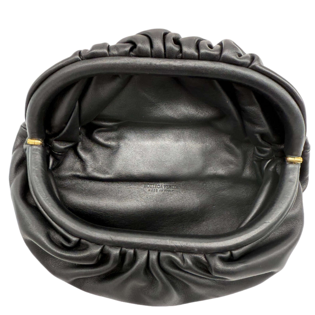 Interior view of Bottega Veneta The Pouch Chain bag showcasing its soft calfskin leather and ruched design.