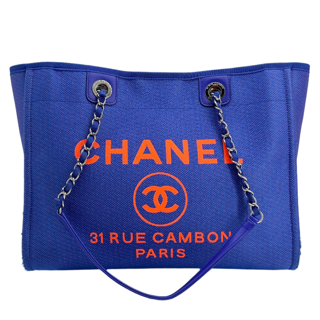 Chanel Mixed Fibers Small Deauville Tote in blue and orange canvas with iconic logo and elegant handles.