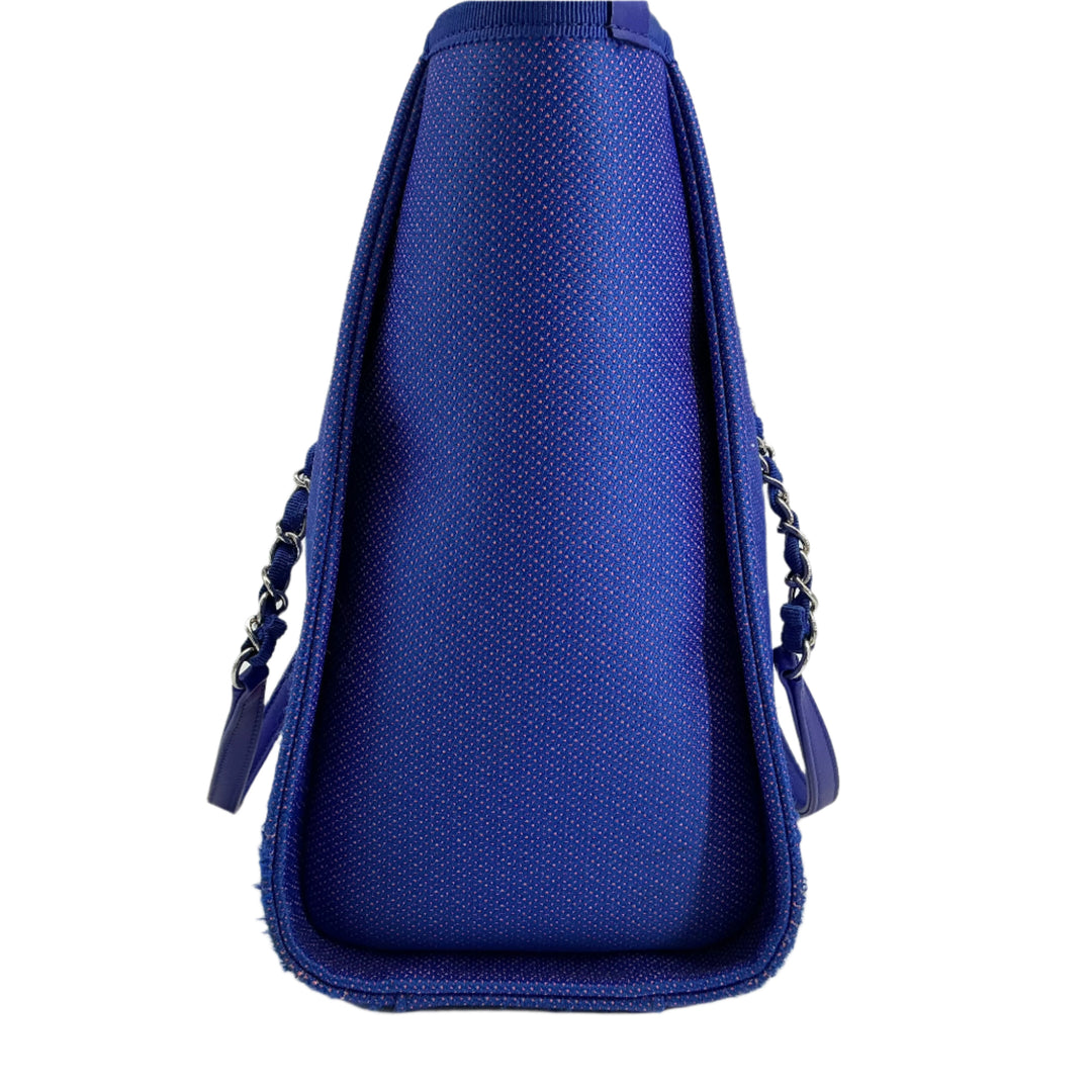 Chanel Mixed Fibers Small Deauville Tote showcasing vibrant blue canvas and elegant side view design.