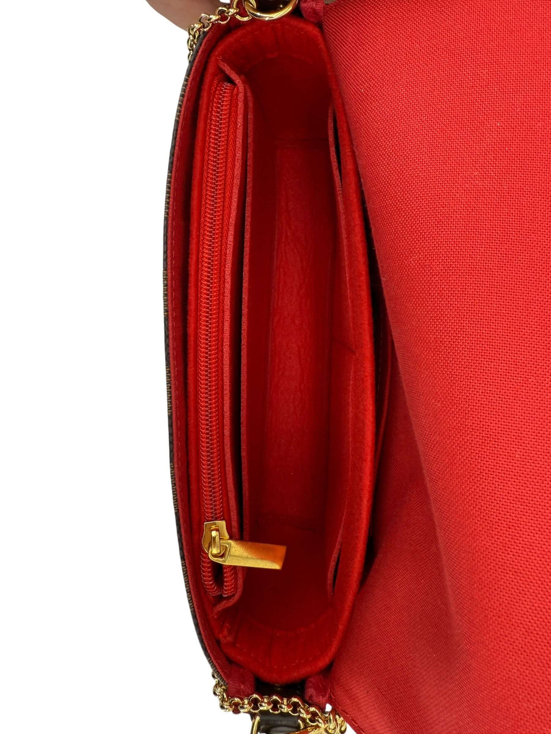 Interior view of the Louis Vuitton Damier Ebene Favorite MM Bag | LuxLoveLouis showing red lining and zipper pocket.