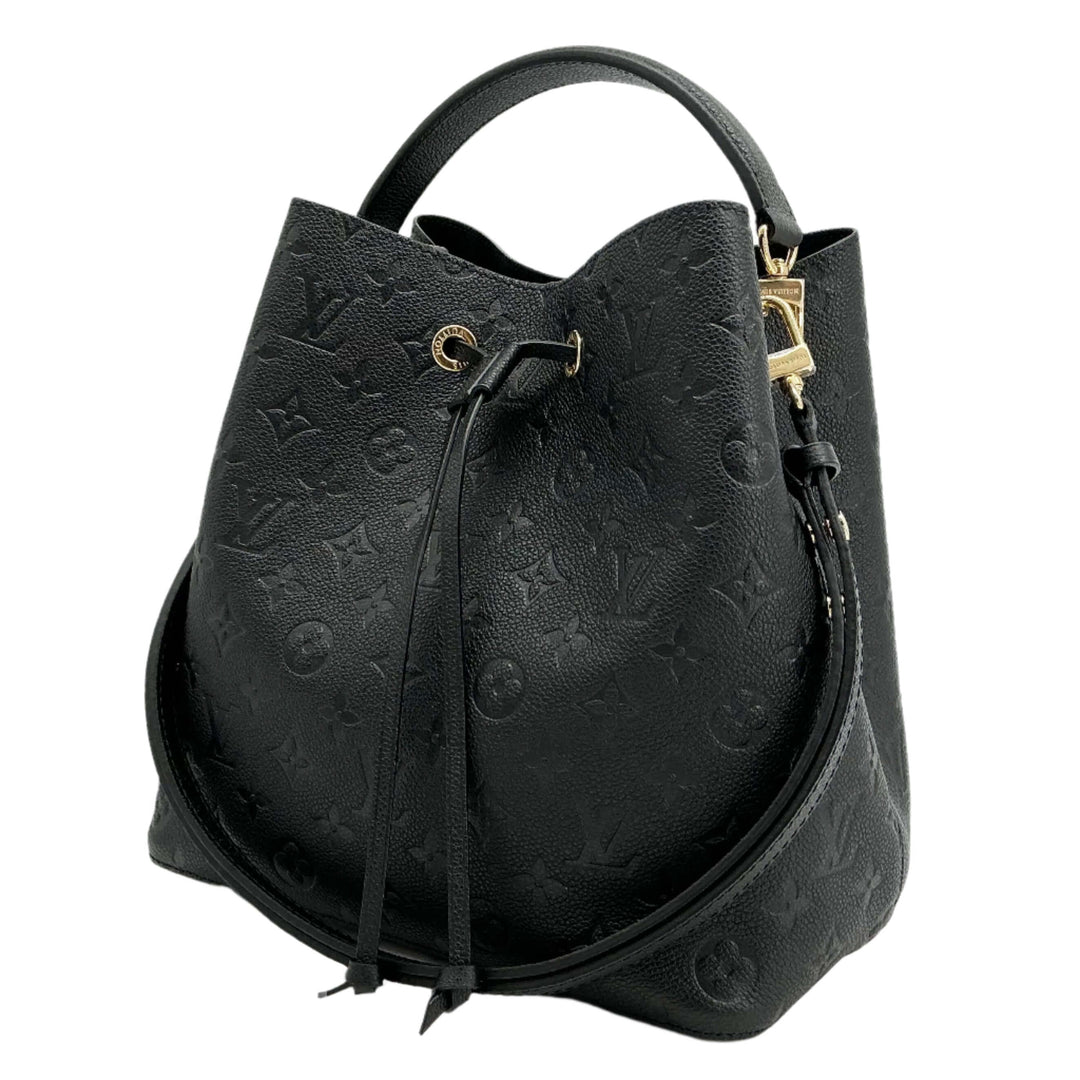 Louis Vuitton Empreinte Neonoe MM Bucket Bag in black embossed monogram leather with a removable shoulder strap.