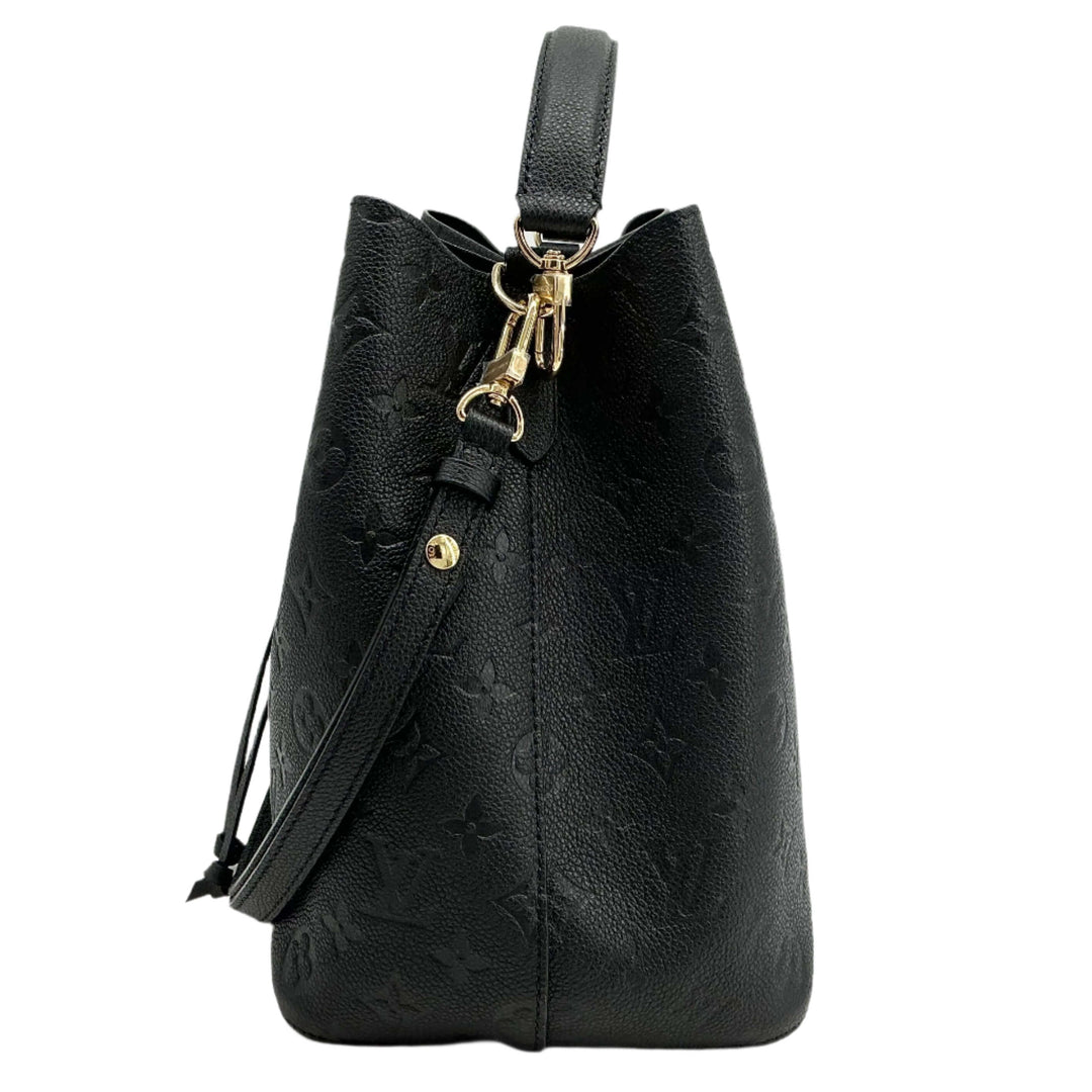 Side view of Louis Vuitton Empreinte Neonoe MM Bucket Bag in black monogram leather with removable shoulder strap.