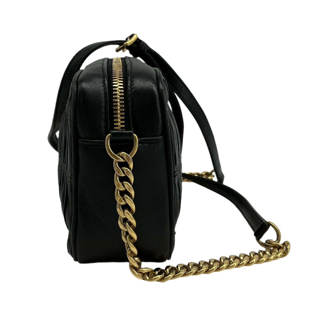 Prada Nappa Gaufre Camera Bag in black pleated lambskin leather with gold-tone chain strap.