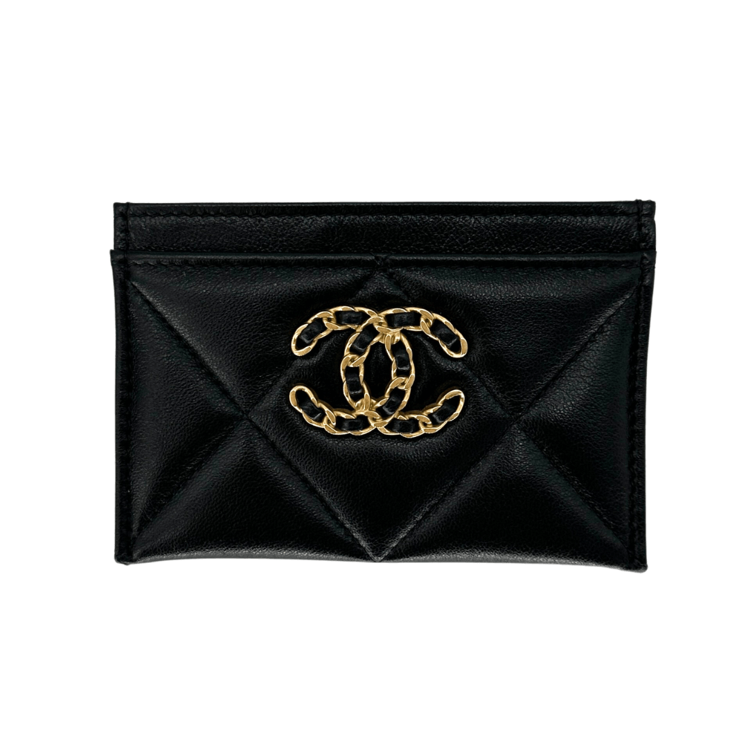 Authentic Chanel black quilted card holder with gold logo front view