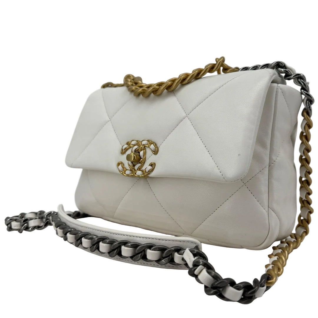 Authentic Chanel black quilted card holder with gold logo front view