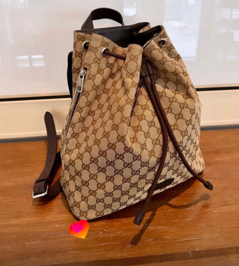 Gucci GG Canvas Drawstring Backpack Medium