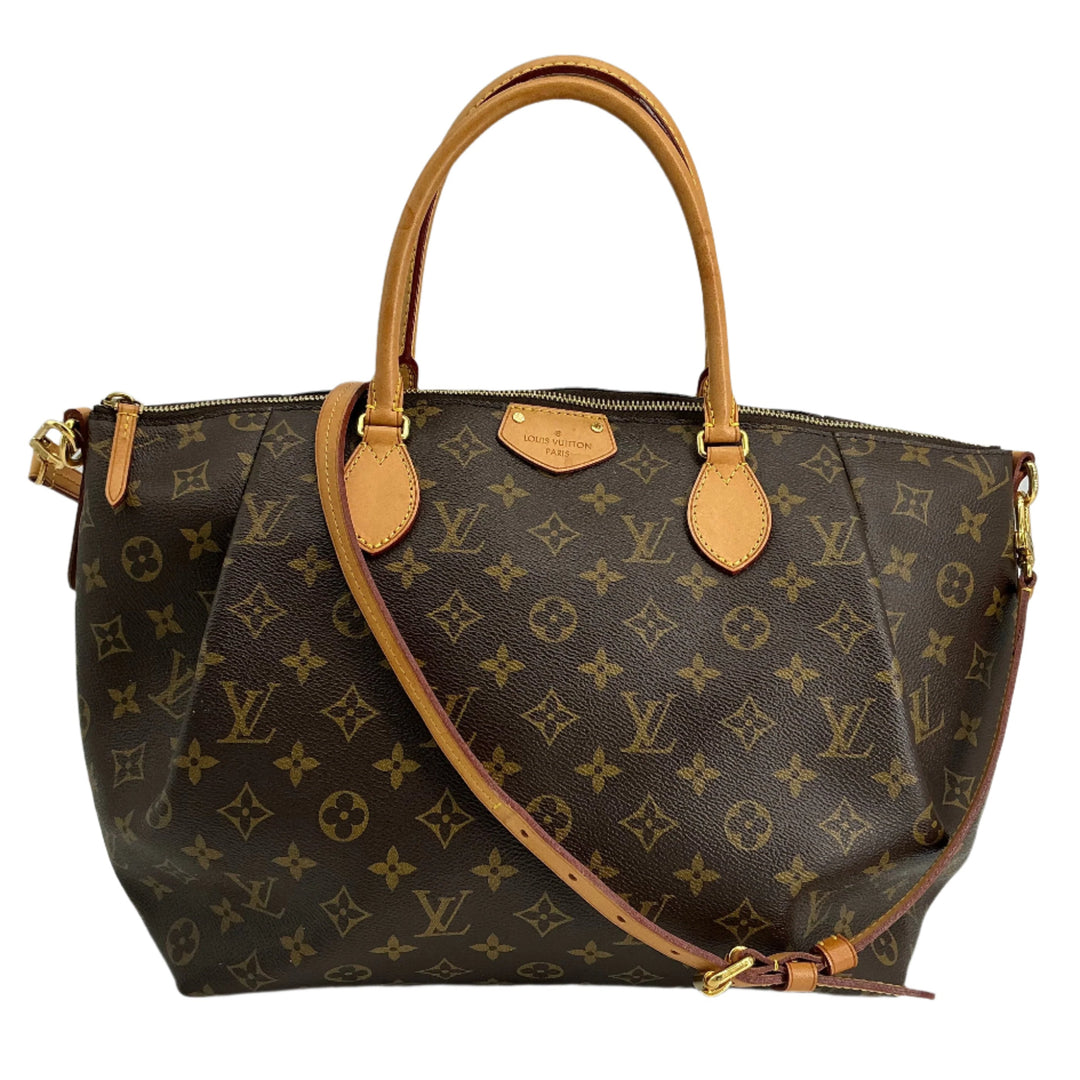Louis Vuitton Monogram Turenne MM handbag with top handles and adjustable crossbody strap.
