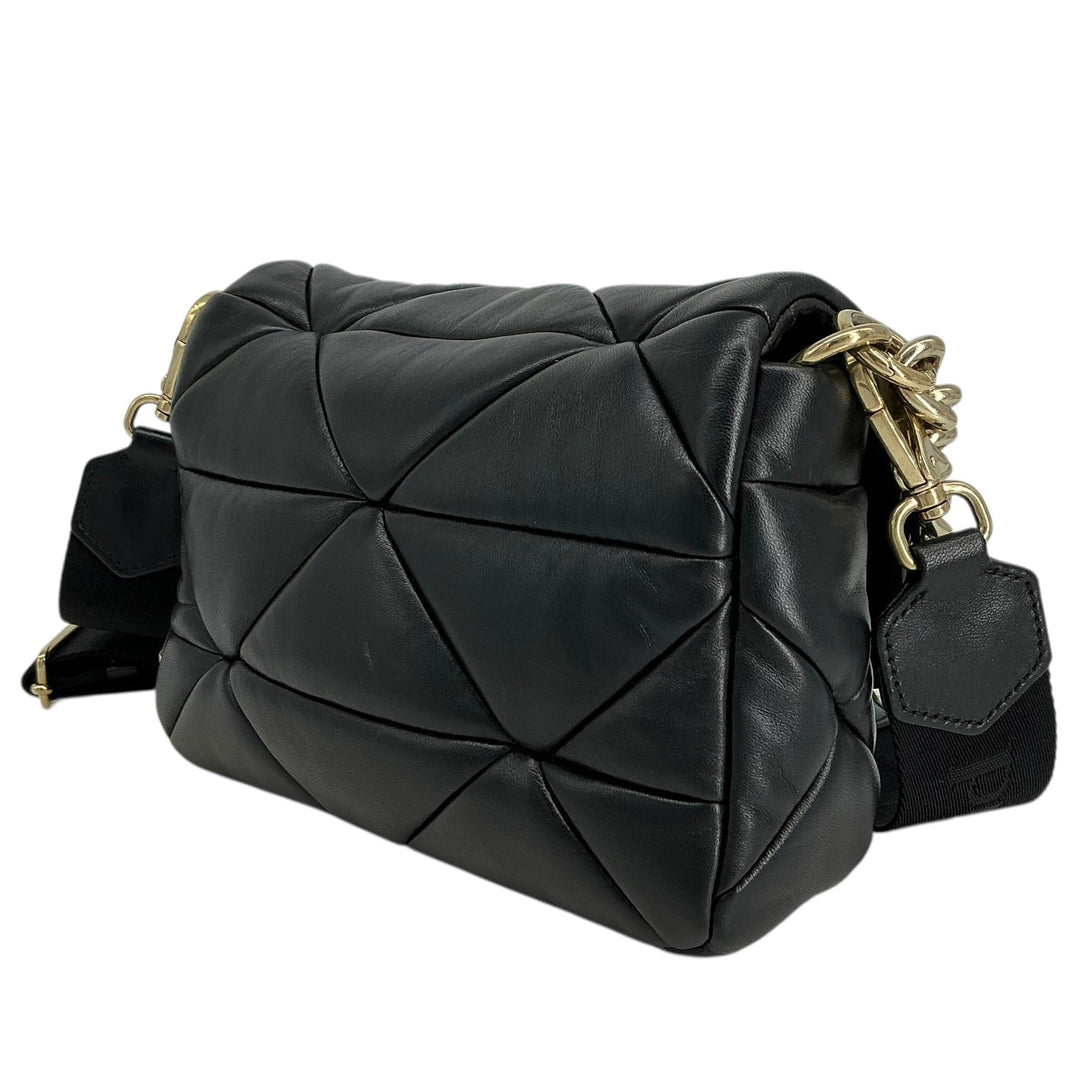 Black quilted leather shoulder bag with geometric paneling and gold-tone hardware, shown on a plain white background.