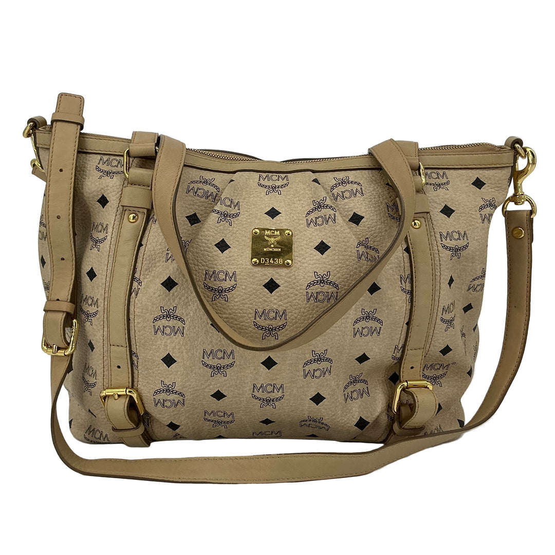 MCM Visetos Medium Essentials Shopper Tote in beige with black monogram, perfect for everyday luxury and style.