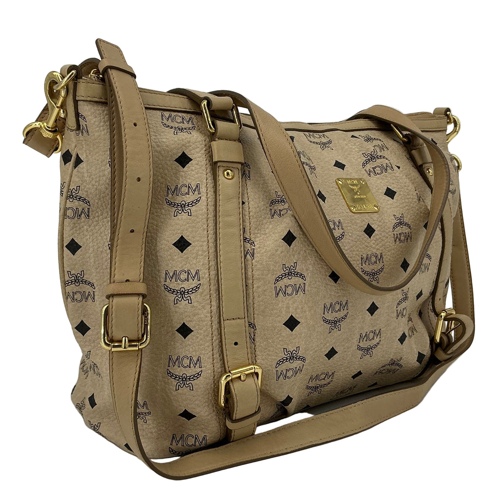 MCM Visetos Medium Essentials Shopper Tote in beige with black monogram and leather trim, stylish carryall for everyday use.