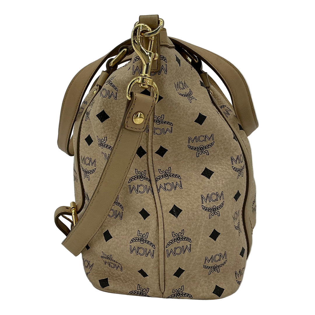 MCM Visetos Medium Essentials Shopper Tote in beige with black monogram and leather trim for stylish everyday use.