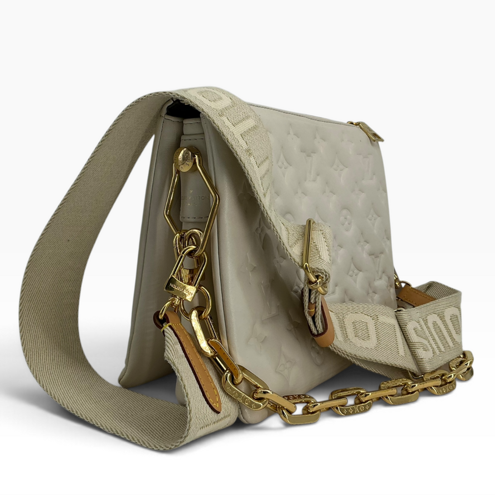 Louis Vuitton Coussin PM cream lambskin side profile and gold hardware