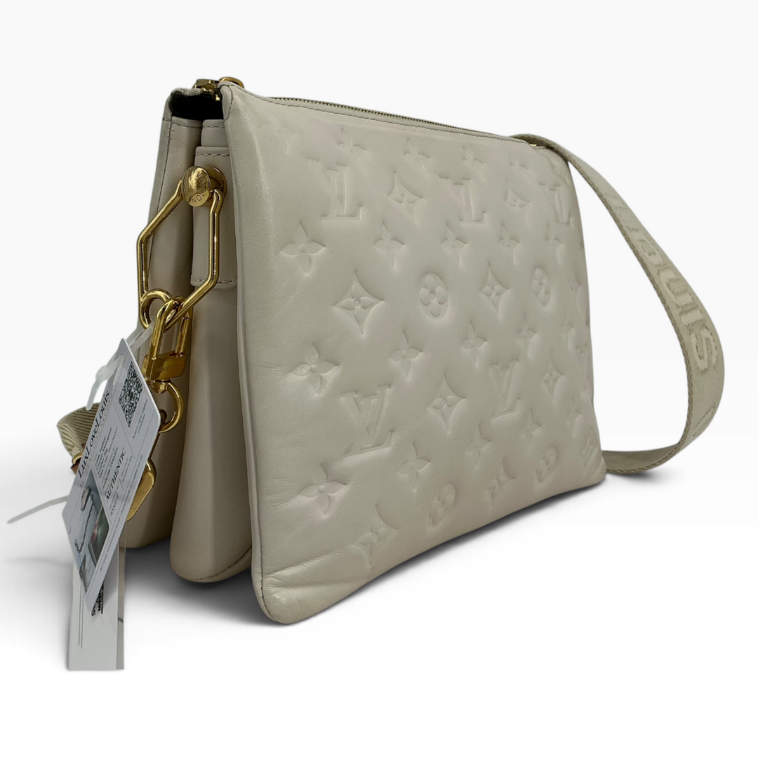 Louis Vuitton Coussin PM cream lambskin three quarter side condition