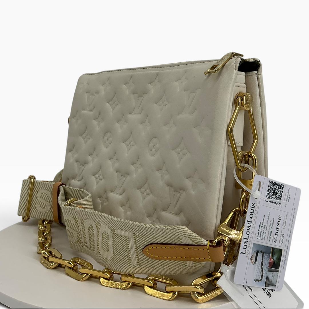Louis Vuitton Coussin PM cream lambskin three quarter side angle view condition