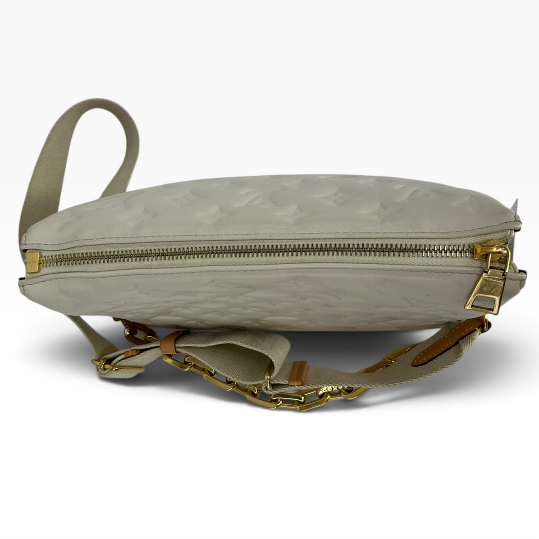 Louis Vuitton Coussin PM top zipper and embossed lambskin detail