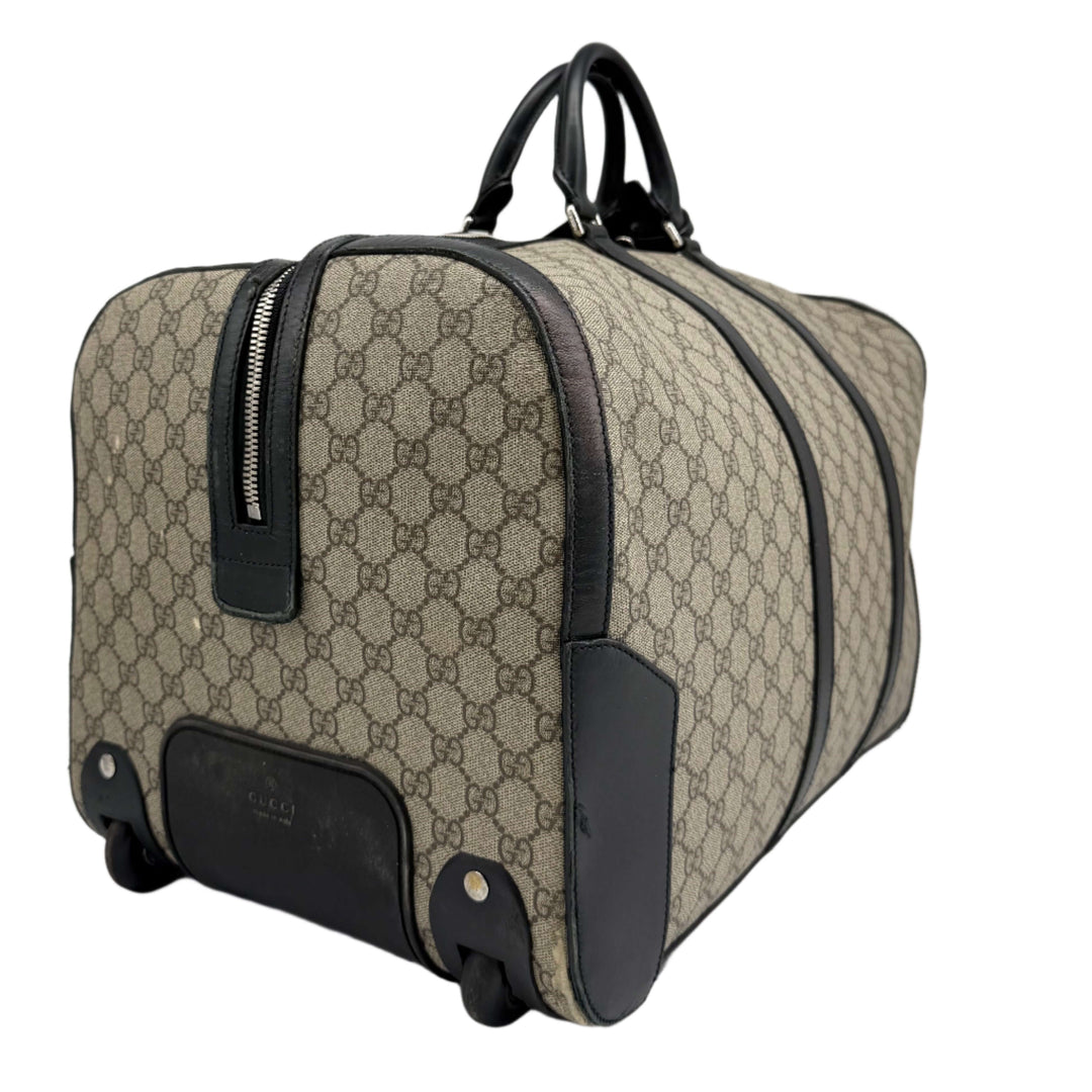 Authentic Gucci GG Supreme Duffle Carry-on Bag in beige canvas with leather accents, perfect for luxury travel.