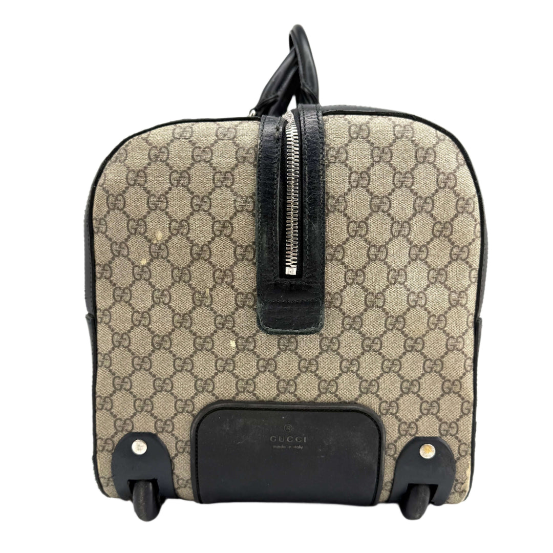 Authentic Gucci GG Supreme Duffle Carry-on Bag in beige canvas with black leather accents.