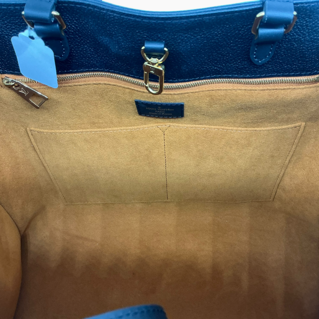 Louis Vuitton OnTheGo GM orange microfiber interior pockets
