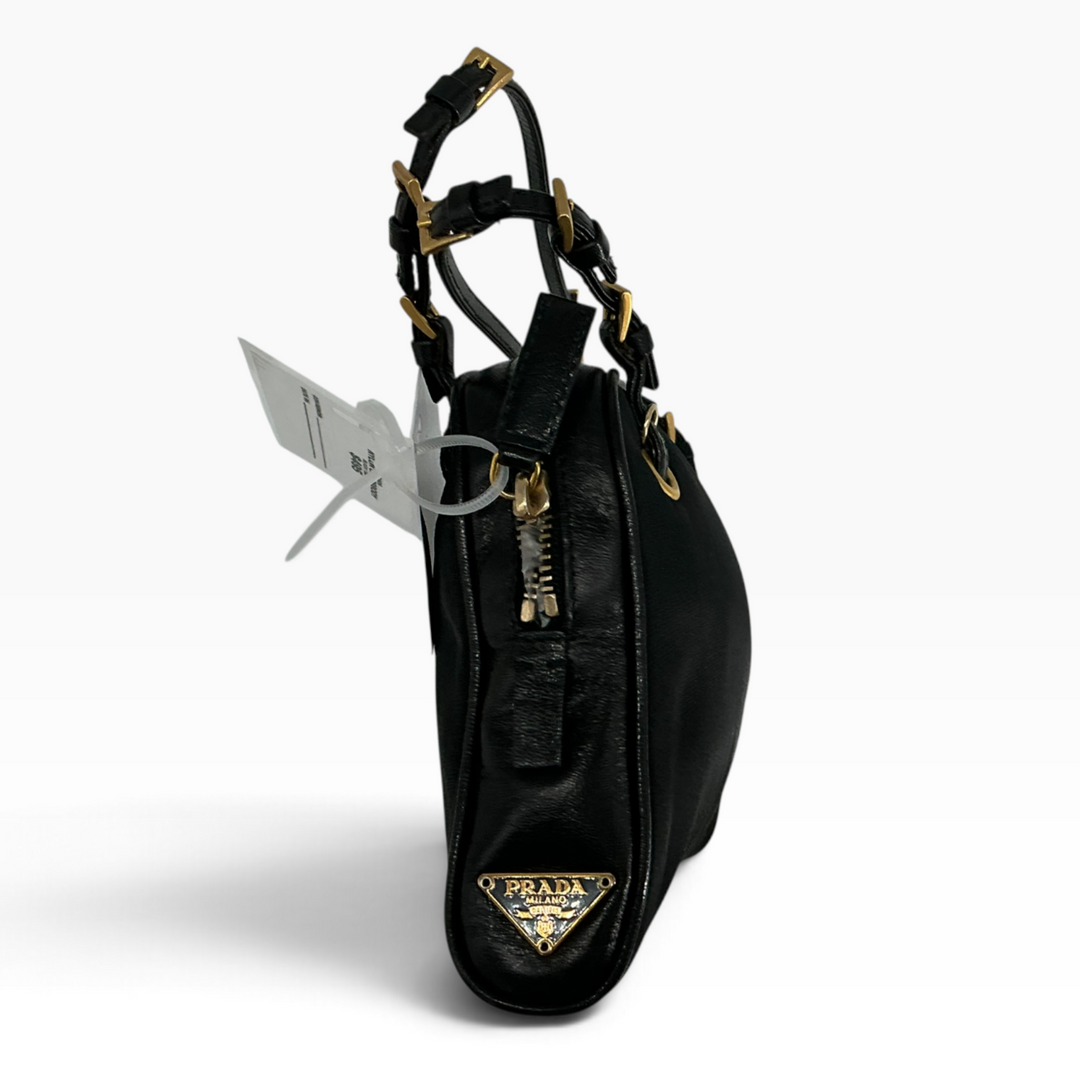 Prada black mini bag side profile with triangle logo