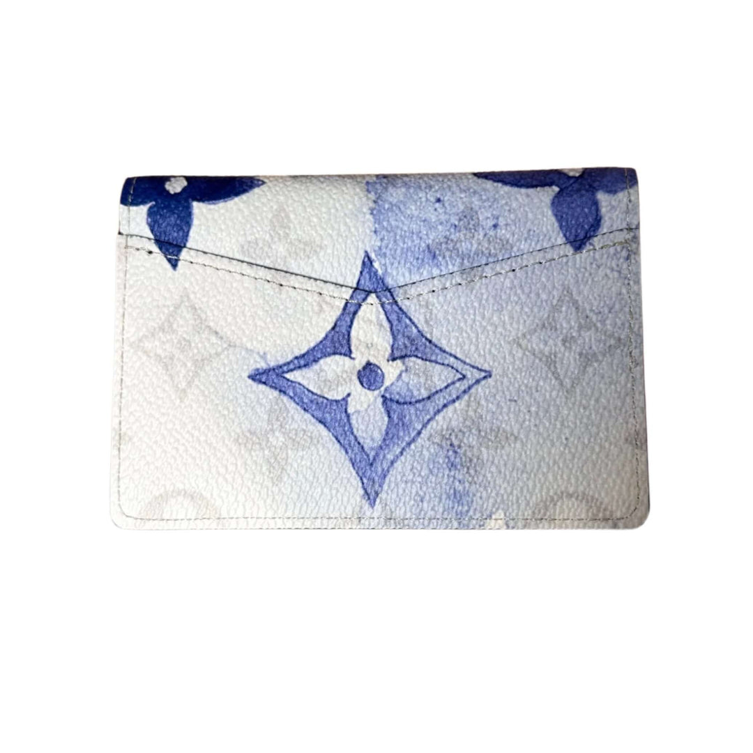 "Louis Vuitton Monogram Watercolor Pocket Organizer in blue, showcasing luxury design with watercolor pattern and monogram details"