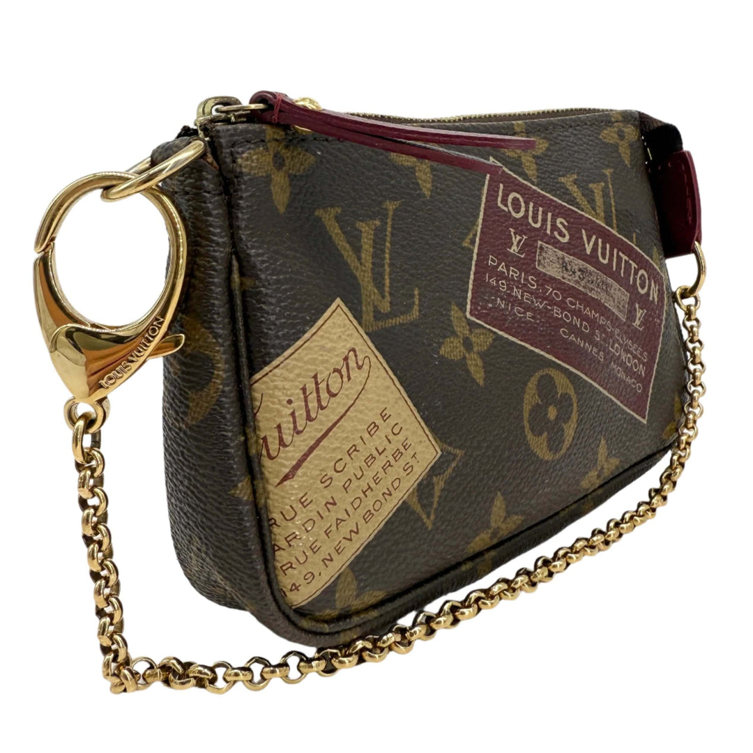 Louis Vuitton Monogram Stamp Mini Pochette Accessories with vintage illustrations and gold chain.