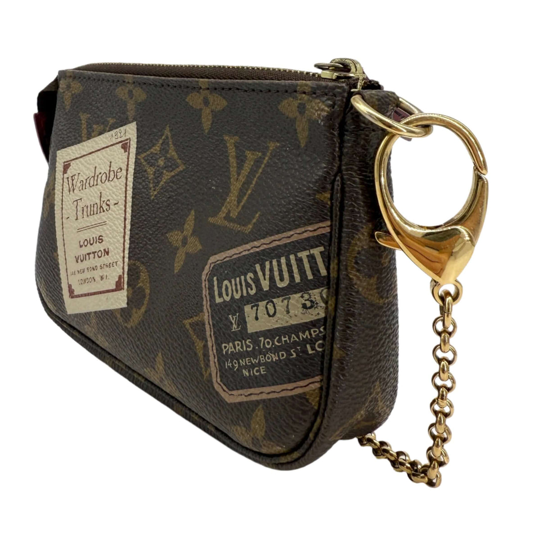 Louis Vuitton Monogram Stamp Mini Pochette Accessories featuring vintage-inspired illustrations and classic monogram canvas.