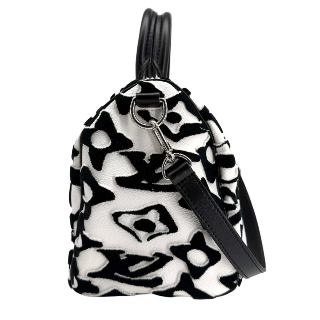 Louis Vuitton x Urs Fischer Speedy Bandoulière 25 bag in tufted white and black monogram design, showcasing luxury and artistry.