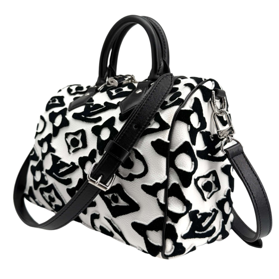 Louis Vuitton x Urs Fischer Speedy Bandoulière 25 in tufted white and black monogram, a limited collector’s edition handbag.