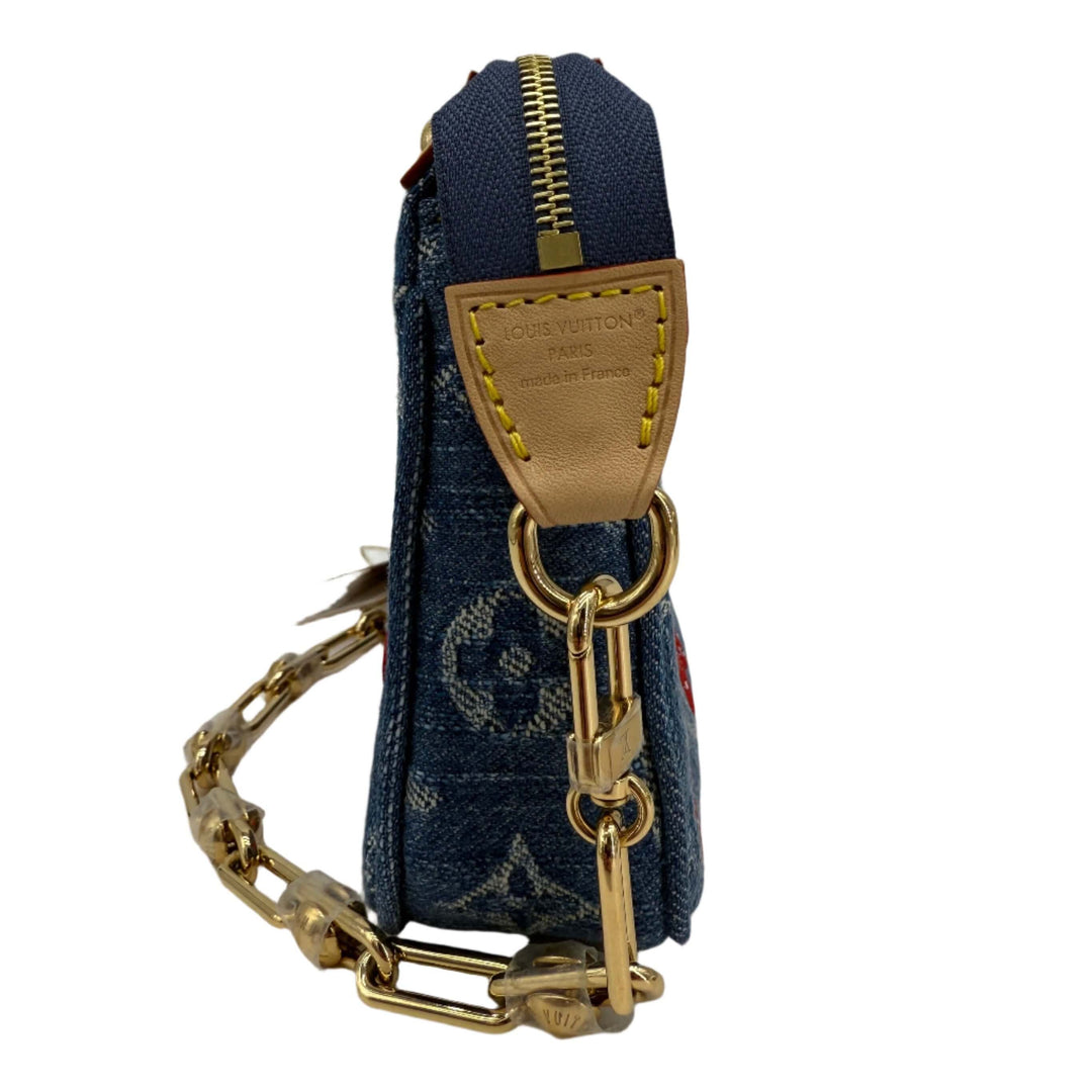 Authentic Louis Vuitton x Murakami Pochette Accessoires side view, showcasing denim design and gold hardware.