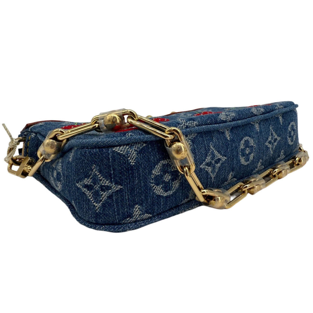 Authentic Louis Vuitton x Murakami Pochette Accessoires in Monogram Cherry Denim with gold chain detailing.
