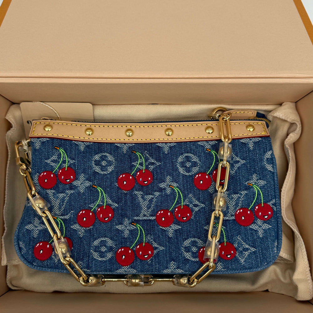 Authentic Louis Vuitton x Murakami Pochette Accessoires in monogram cherry denim, featuring red cherry design and gold chain.