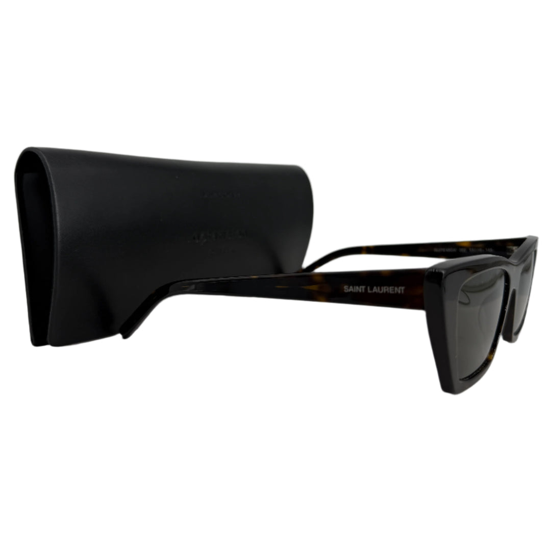 Saint Laurent Eyewear Cat Eye Frame Sunglasses with black case, handcrafted in Italy, featuring a bold silhouette.