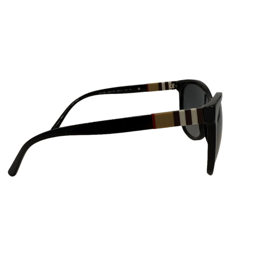 Side view of Burberry B4199 cat-eye sunglasses in glossy black acetate with iconic check pattern accents.