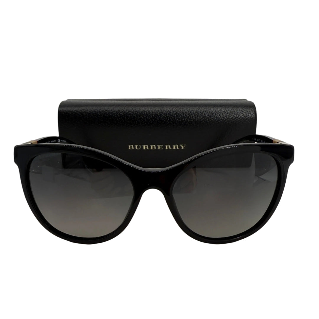Burberry B4199 cat-eye sunglasses in glossy black acetate with protective case, showcasing timeless elegance.